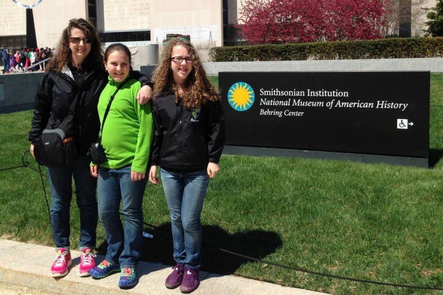 Freshman Rebecca Hofmann poses with her mother and sister at the Smithsonian Museum.