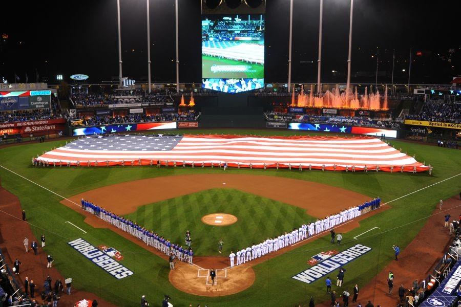 The flag ceremony commences in Game 1 of the World Series. The Royals won the series, 4-1. 