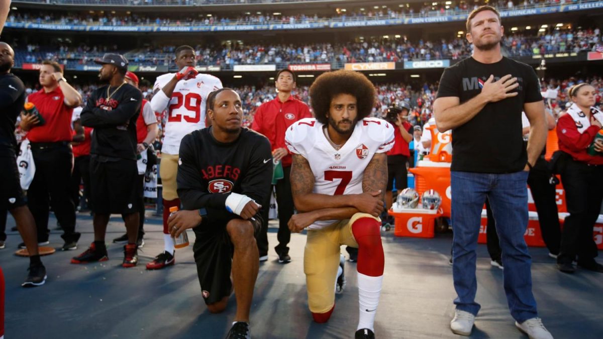 Kapernick is kneeling to respect the fallen soldiers. 
Image obtained from: Credit Mark Zaleski/Associated Press 
