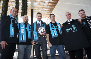 David Beckham accompanied by team officials and Commissioner Don Garber after the big reveal. Image from http://wvhooligan.com/2014/06/11/beckham-group-on-to-plan-c-in-miami/.