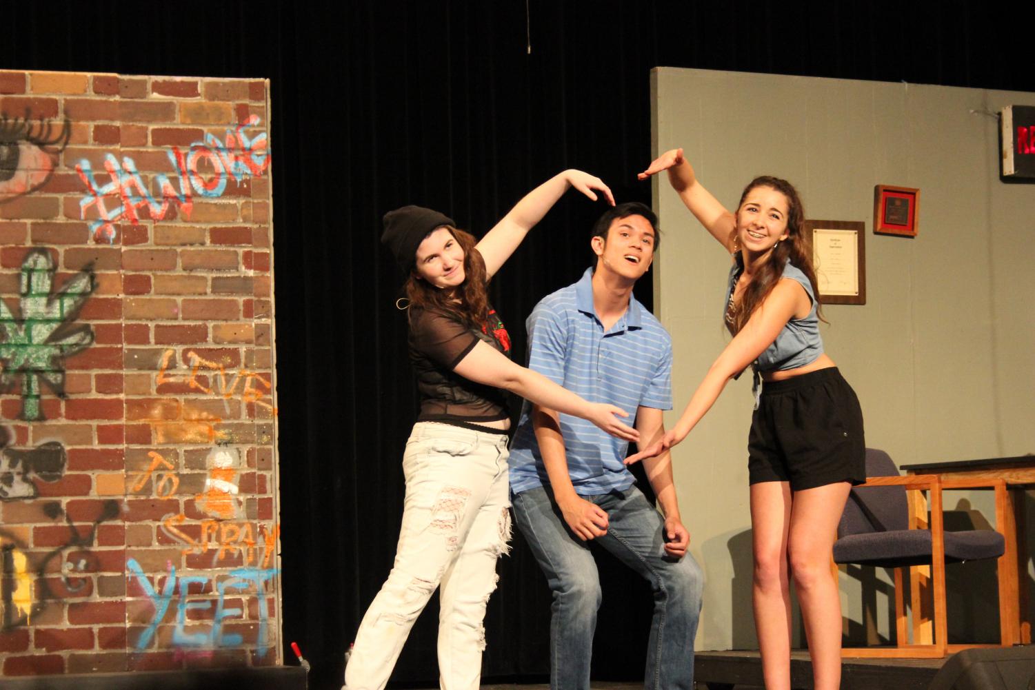 Kaitlyn Rauch (12), Trevor Caragan (12), and Eleanor Home (10) in Jordan Greene's take on 21 Chum Street, by playwright Lin Manuel Miranda. Photo taken by Kiana Greene.
