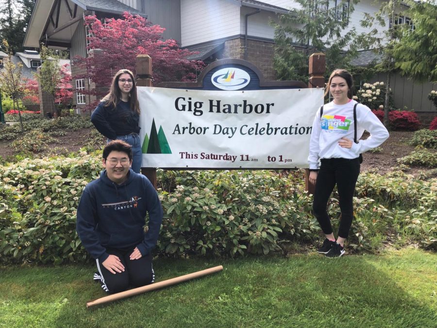Key club at Volunteering at Arbor Day Celebration. Maddie Simmons (11), Katherine Jones (11), and Nicholas Shin (10). Photo Credit Tyra Stout (11).