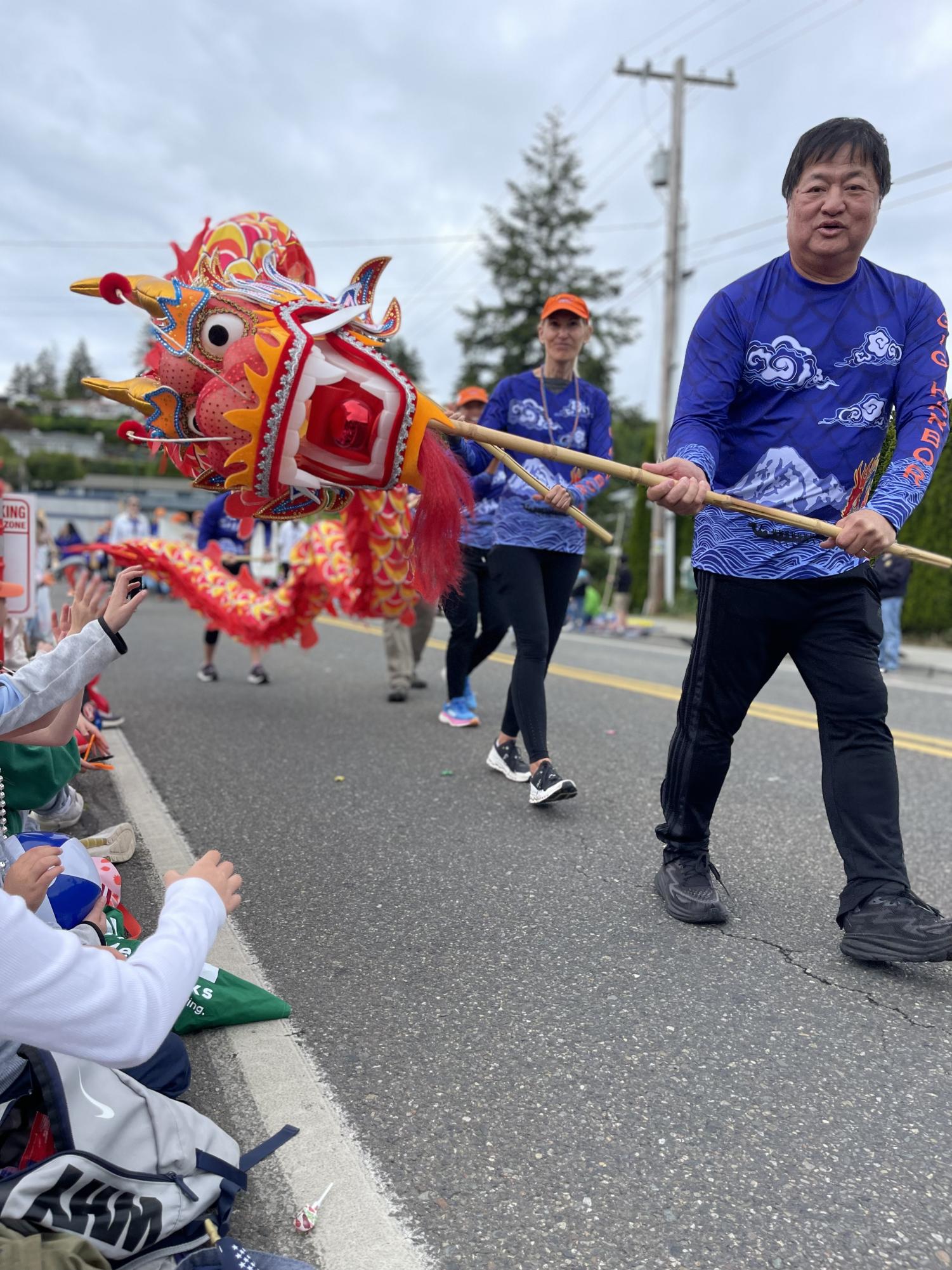 A dragon is displayed as a part of the Maritime Parade