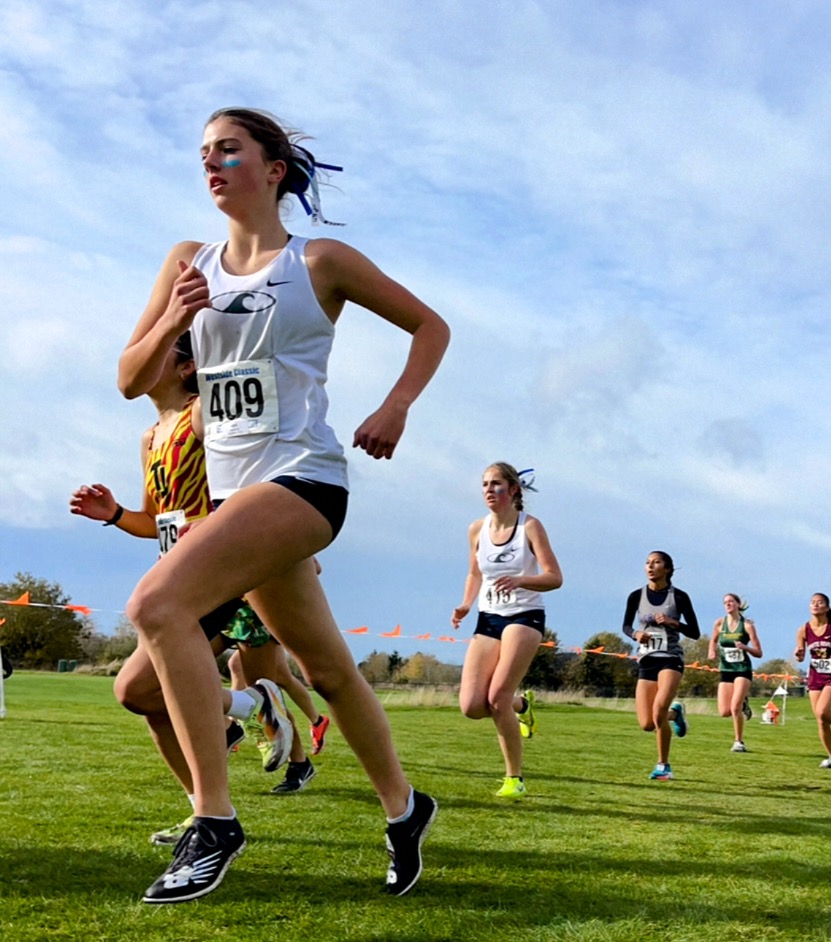 Laila Flynn (11) and Sofia Simmonds (12) run the 5k.